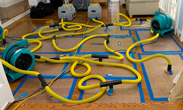 Professional Flood Damage Restoration technician working in Garrett, WA